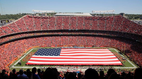 Chiefs players lock arms during national anthem, Marcus Peters raises fist