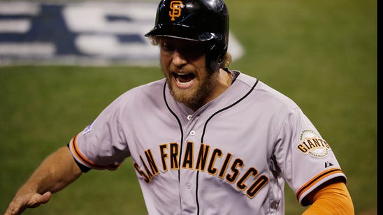 Hunter Pence and a piglet posed for a photo at spring training - because why not?