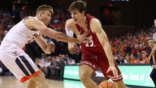 Badgers suffocated by Virginia in defensive battle, 49-37