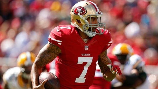 Colin Kaepernick's 49ers teammates claim he isn't a distraction -- yet