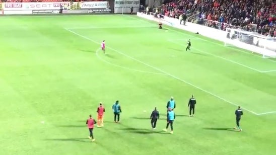 Watch this one-legged Dundee United fan score a Cantona-esque chip
