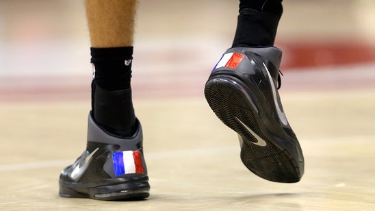 Gobert wears native France on his shoes, then helps Jazz past Hawks