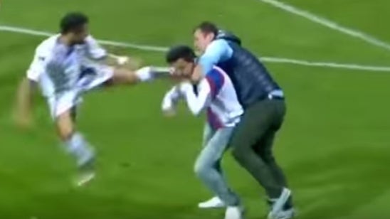 Turkish fan gets kung-fu kicked in the head for attempting to injure referee