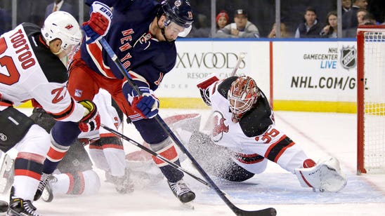 Devils win in overtime, hand Rangers third straight loss