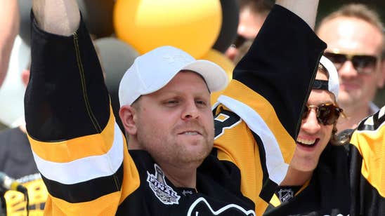 Phil Kessel's grandmother chugs champagne out of the Stanley Cup