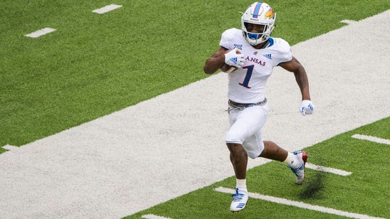 Jayhawks, Cowboys have strong running games that were diminished in losses