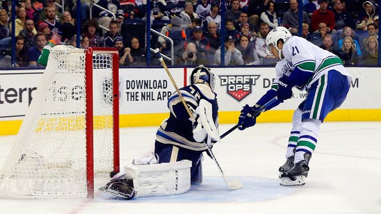 Road-worn Canucks keep Blue Jackets winless at home