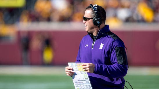 Fitzgerald won't rush QB decision for Wildcats