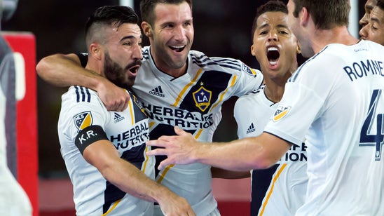 Stoppage time frenzy powers Galaxy past Revolution, 3-2