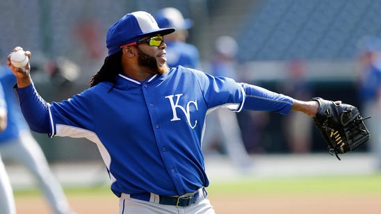 Johnny Cueto signs for Royals fans, looks weird in blue