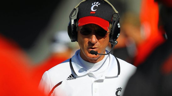 Watch Cincinnati coach Tommy Tuberville fire back at heckling fan after a loss