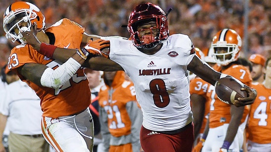 Louisville bans football players from signing autographs