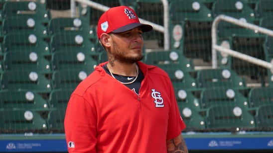 Yadi working back from offseason knee surgery, catches Mikolas in spring game