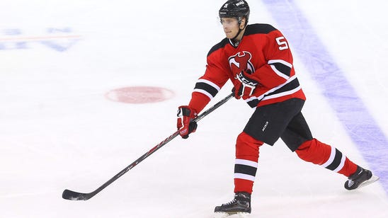 Devils re-sign defenseman Larsson to six-year contract