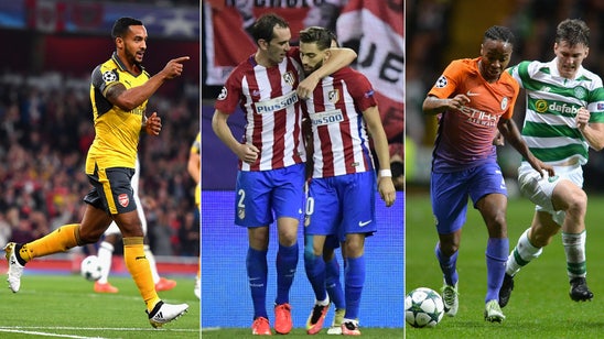 Walcott leads Arsenal, Atletico bests Bayern again in Champions League