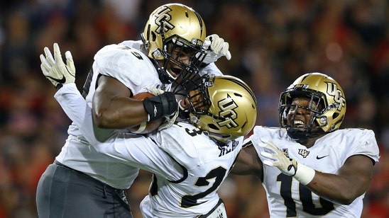 UCF rides wave of big plays, throttles Cincinnati in rain-shortened affair