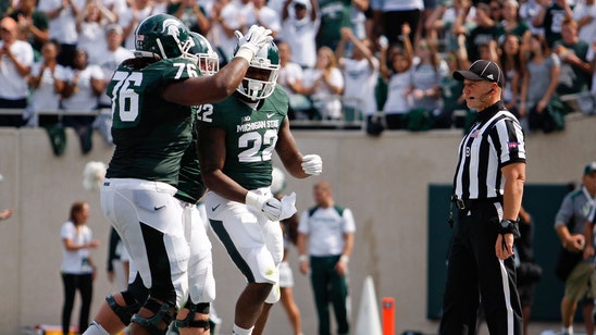 Michigan State sets return date for suspended running back