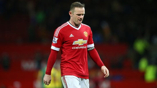 Rooney says United's players are fully behind Van Gaal