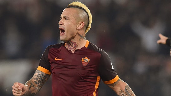 Roma strike late to fend off Inter Milan, split points in draw