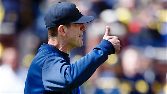 Harbaugh appears happy with beginning of satellite camp tour