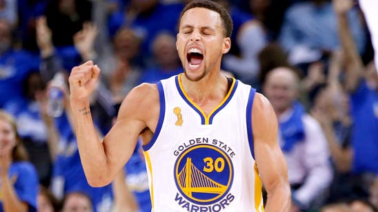 Champs raise banner, Curry rings in season with 40 in win