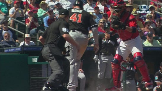 Flawless sweeping tag highlights Yadi's return behind plate
