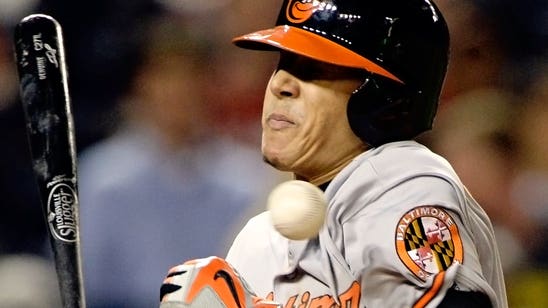 Machado homers, gets plunked as O's top fading Nationals