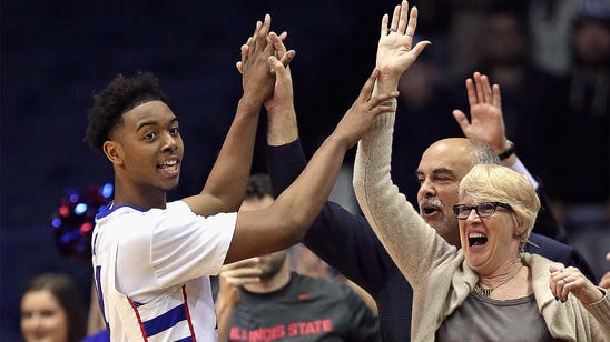 Role reversal: DePaul players storm the stands