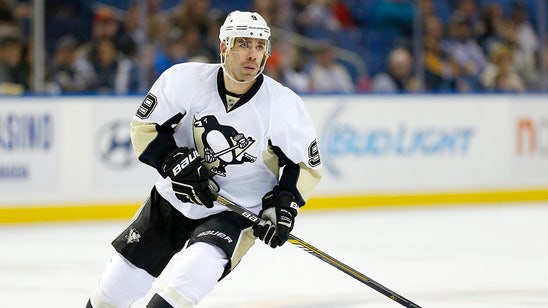 Penguins' Dupuis returns to practice following health scare