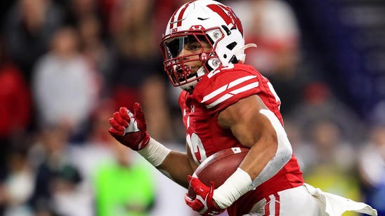 Badgers' Taylor etches name among greatest college football running backs