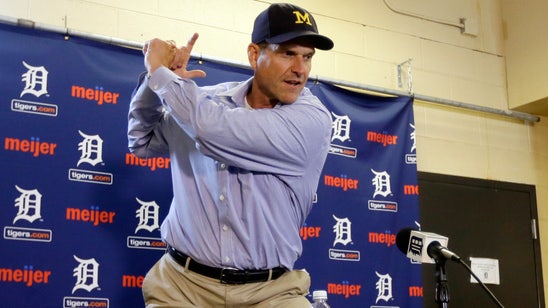 Harbaugh lives out dream, throws first pitch before Tigers' game
