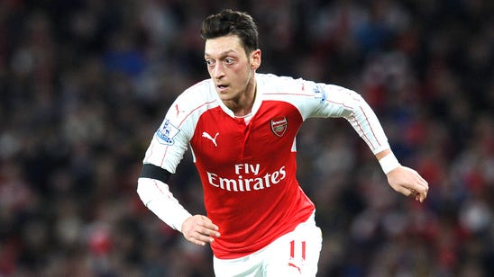 Arsenal chief Arsene Wenger hails 'complete athlete' Mesut Ozil
