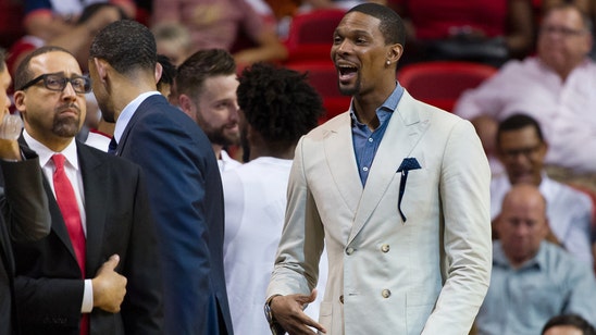 As Heat hit road, Chris Bosh with team to show support