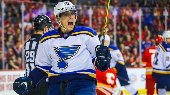 Perron collects hat trick as Blues defeat Flames 6-4