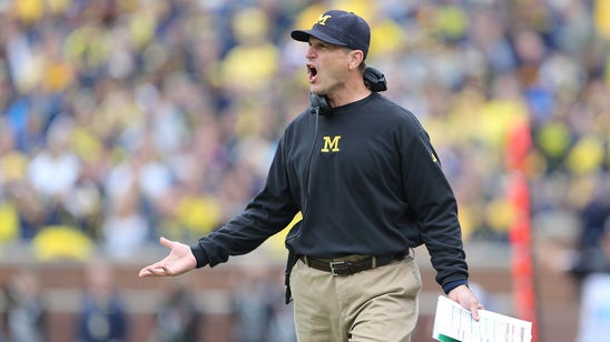 WATCH: That time Harbaugh was caught wearing Michigan St. gear
