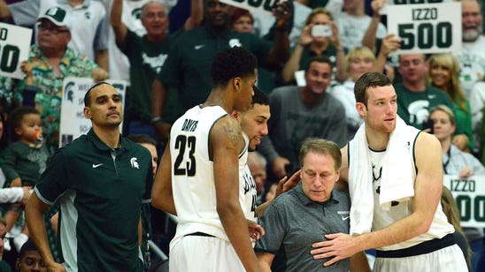 Michigan State's Matt Costello finishes one-handed dunk over Nebraska defender