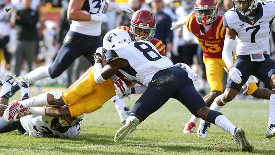 Karl Joseph wears headset, changes roles for West Virginia