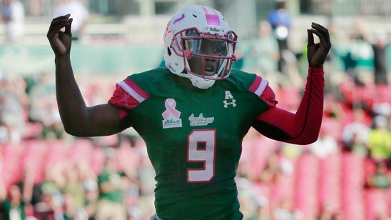 Quinton Flowers tops 200 rushing yards as USF bests SMU