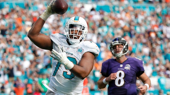 Dolphins score 2 TDs in 20 seconds, hold on to beat Ravens
