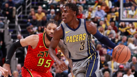 Holiday leads Pacers to 97-89 comeback win after Oladipo leaves game