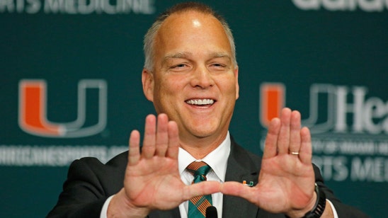 WATCH: Miami players teaching Richt how to hoverboard