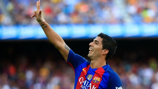 Watch Luis Suarez complete his hat trick with sensational free-kick goal