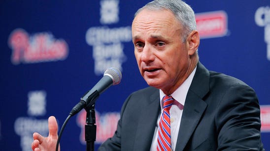 Fan hit in head by foul ball at same game Manfred talks up safety