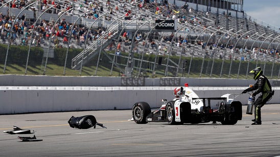 Car flies on pit road during IndyCar race at Pocono