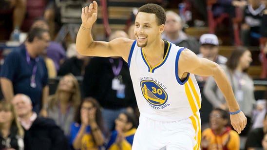 WATCH: Stephen Curry is launching 3-pointers from the half-court logo