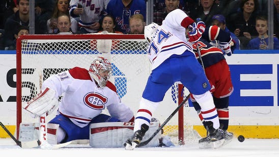 Price injured, Lundqvist pulled as Habs turn showdown into rout