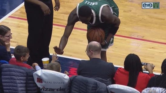 Bucks-Wizards Twi-lights: Snell gives tiny fan a big high-five