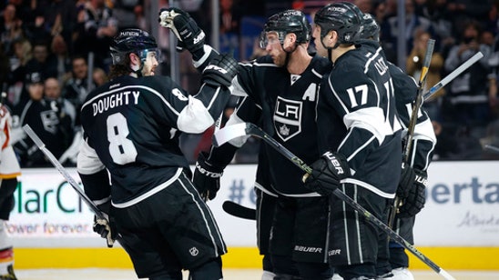 Carter, Quick help Kings beat Flames to reclaim Pacific lead
