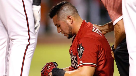 D-backs' Peralta OK after hit in head by pitch from Marlins' Fernandez