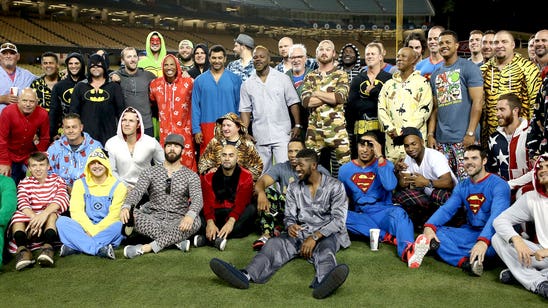 PJ party! Cubs don one-piece jammies for flight home